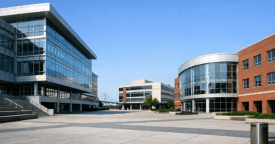 Modern buildings in a spacious plaza.